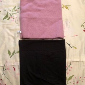 Two neck warmers for riding.